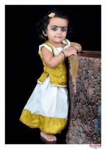 Dr. Dileep from Carewell Homeopathic Fertility Clinic with baby born after successful homeopathy treatment for infertility in Kerala (Case #1)